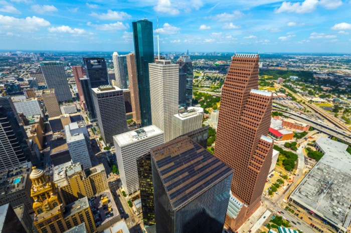 aerial of modern buildings in downtown Houston in daytime
