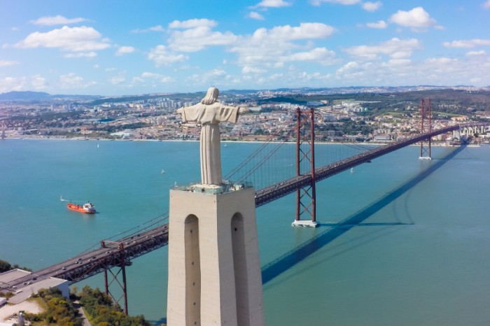 Aerial view Jesus Christ monument watching to Lisbon city in Portugal