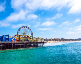 Santa Monica, USA - September 23, 2014: Many people spend their time at Pacific Park on May 4, 2014 in Santa Monica Pier, Los Angeles, CA, USA