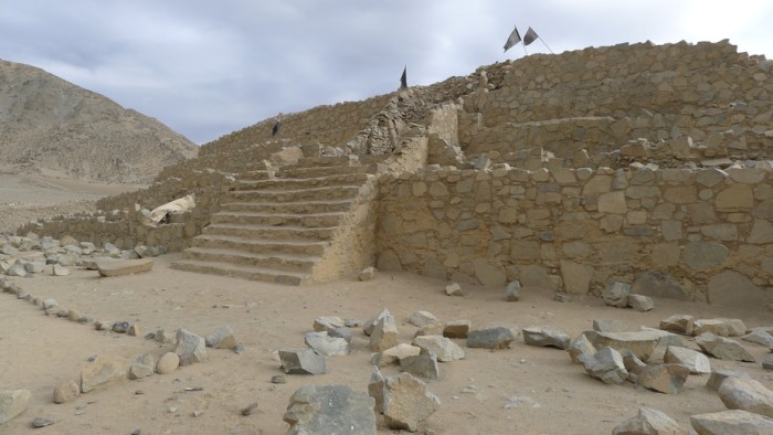 One of the pyramids in Caral of about 5000 years old. Caral was the capital of Caral Civilization, the first of America. Caral is considered by UNESCO as a World Heritage Site. It is located in the Supe Valley, 200 kilometers north of Lima, Peru