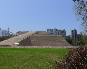 Lima, Peru. November 10, 2015. Side view of the pyramid called Huaca Huallamarca and its gardens. It is circa 2000 years old.  In the district of San Isidro in Lima this important archaeological complex is located in the center of the district surrounded by modern buildings and houses. This photo was taken by a Lumix camera equipped with a Leica lens.