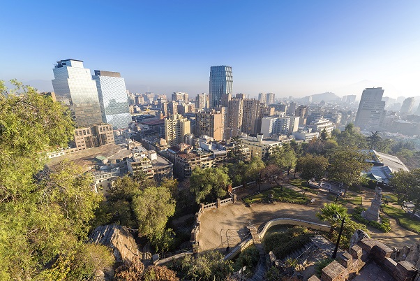 View of the skyline of Santiago, Chile with a park visible shot from Cerro Santa Lucia