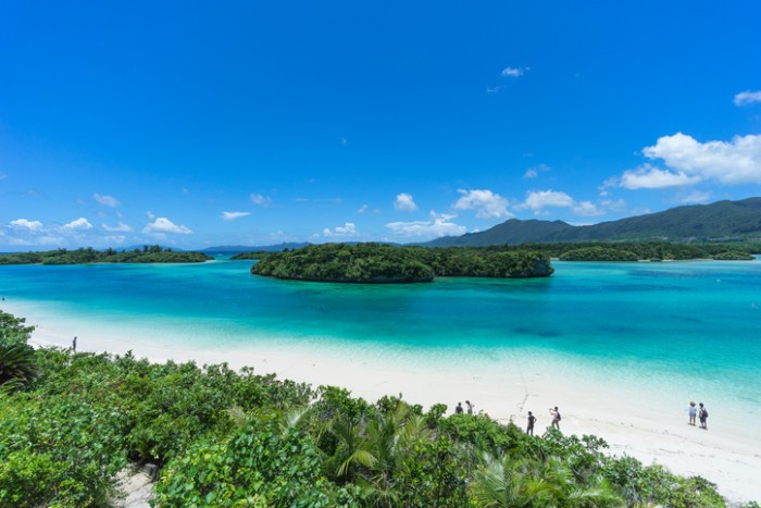 White sand tropical beach with clear blue lagoon water, Kabira Bay, Ishigaki Island National Park of the Yaeyama Islands, Okinawa, Japan