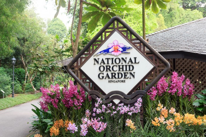 Singapore, Singapore - May 22, 2015: National Orchid Garden sign. The National Orchid Garden is located within the Singapore Botanic Gardens. It is honored as a UNESCO World Heritage Site.