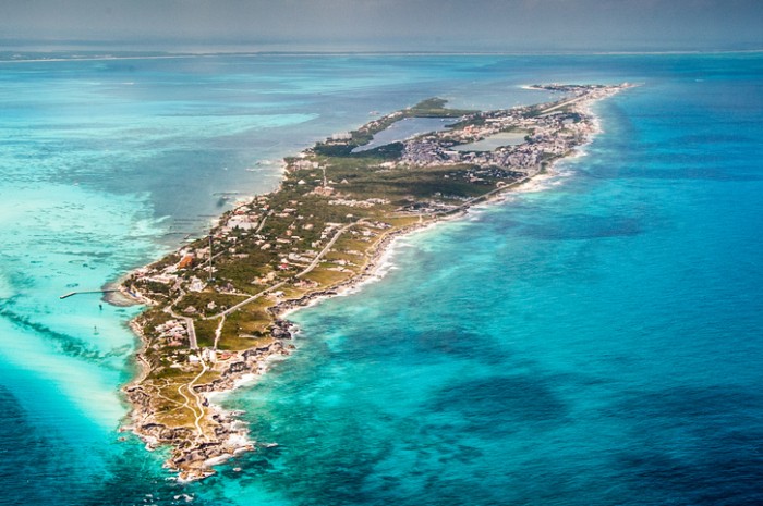 Aerial view of Isla Mujeres and island very close to Cancun. Caribbean waters.