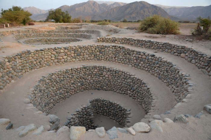 Wells constructions and part of elaborate underground aqueduct system made by the people of Nazca at 400/500 AD, Nazca Desert in southern Peru.