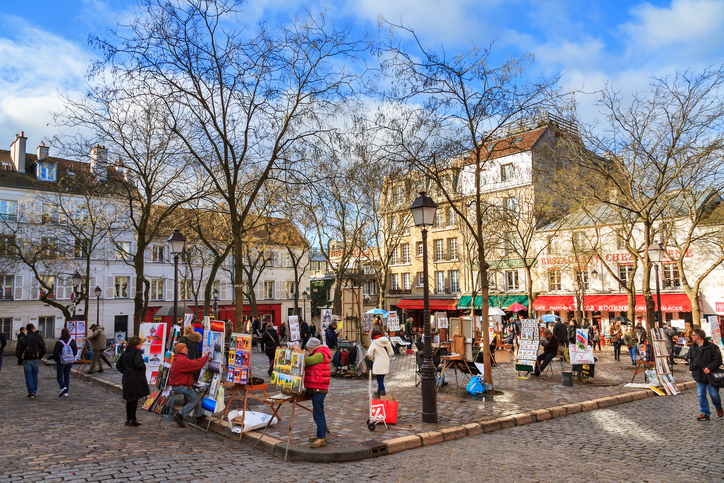 Paris, France - February 21, 2014: Artists selling paintings on the Place du Tertre in Paris, France, on February 21, 2014
