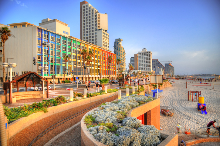 Colorful HDR image of Tel Aviv beach with some of its famous hotels (Mediterranean sea. Israel)