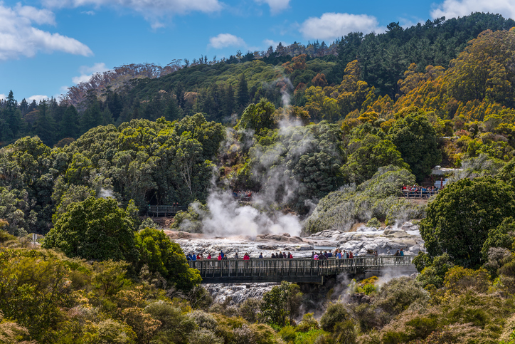 Rotorua, New Zealand - November 20, 2014: People watching Pohutu Geyser in Rotorua, New Zealand