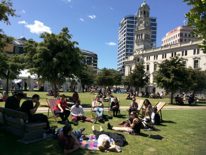 Auckland, New Zealand - October 9, 2015: Young Aucklanders in Aotea Square, Auckland New Zealand. Over 1. 4 million people live in Auckland, New Zealand - around a third of New Zealand's population.
