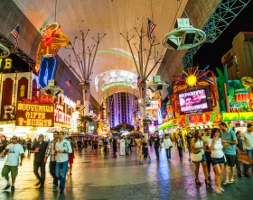 Las vegas, USA - June 16, 2012: people visit Fremont Street in Las Vegas, Nevada . The street is the second most famous street in the Las Vegas. Fremont Street dates back to 1905, when Las Vegas was founded.