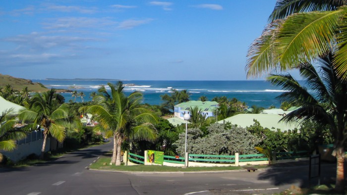 Grand Case, St. Martin-December 29, 2009: Homes are nestled along the hillside and have lovely views of the ocean in the French town of Grand Case on this small Caribbean Island.