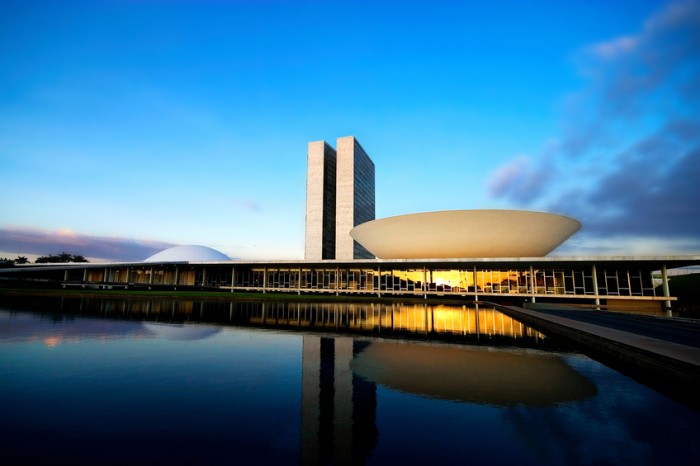 Brasilia, Federal District, Brazil - May 27, 2007: Brazil's Bicameral National Congress is part of the city's main monuments and was projected by the brazilian architect Oscar Niemeyer. Since the 1960s, the National Congress has been located in Brasília. The semi-sphere on the left represents the Senate, and the semi-sphere on the right is the Chamber of the Deputies.