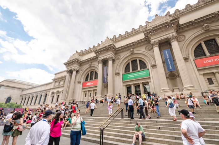 New York, USA - July 17, 2014. People near the entrance into Metropolitan Museum of Art. The Metropolitan Museum of Art is the largest art museum in the United States.
