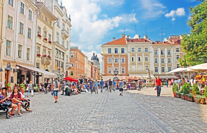 Lviv, Ukraine - July 17, 2015: Market square - historical and tourist centre of the town in Lviv, Ukraine. It is UNESCO World Heritage Site