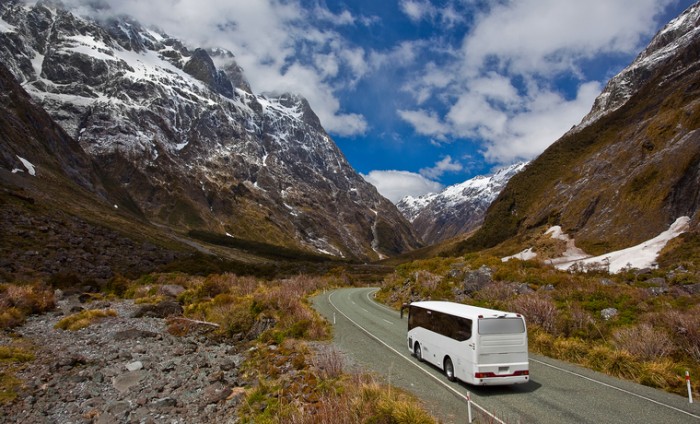 A tourist bus in New Zealand on its way from Milford Sound to Te Anau.