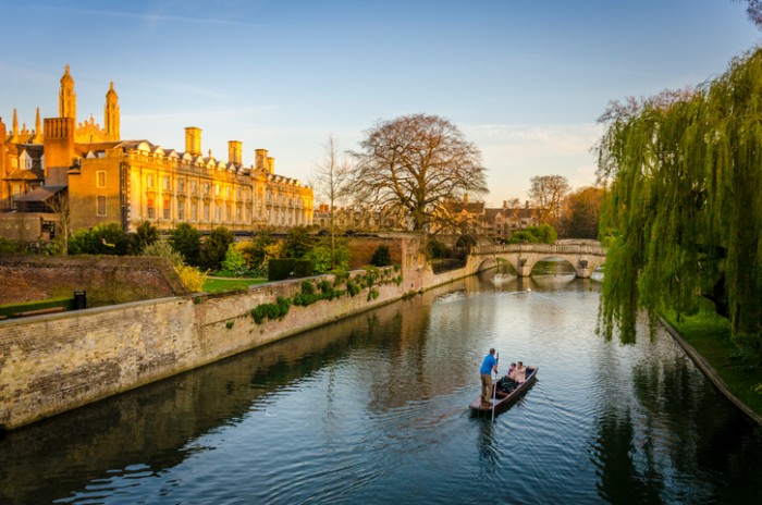 Cambridge, UK - April 21, 2015: Evening punting on the River Cam in Cambridge