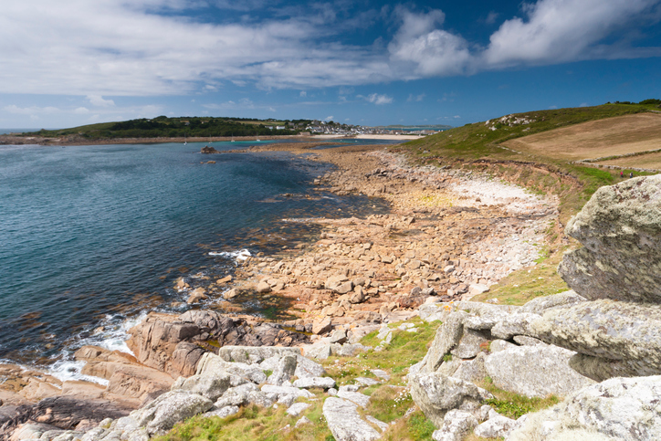 Taken in summer showing part of the lovely coastline of the Scilly Isles. In the distance is the town in St Mary's.