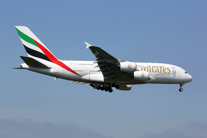 London, United Kingdom - May 13, 2016: An Emirates Airbus A380 with the registration A6-EDU approaching London Heathrow Airport (LHR) in the United Kingdom. The Airbus A380 is the world's largest passenger airliner. Emirates is an airline based in Dubai, United Arab Emirates. It is the biggest customer for Airbus A380 aircraft.