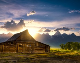 Sunset over the iconic Moulton barn on Mormon Row in Grand Teton National Park, WY