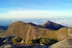 View of Cristal peak in Caparaó mountain range at sunrise from the peak of Bandeira