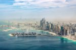 Dubai mantém posição como destino preferido dos brasileiros Aerial view of Dubai Marina skyline with Dubai Eye ferris wheel, United Arab Emirates