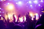 São Paulo volta a receber grandes shows internacionais Cheering crowd with hands in air at music festival